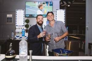 Former professional tennis player, Andy Roddick mixes the iconic Grey Goose Honey Deuce cocktail for fans at the 2016 U.S. Open in New York.